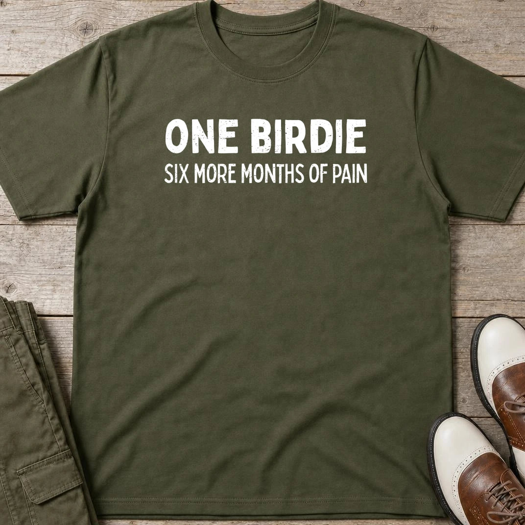 One Birdie T-Shirt in Military Green lying on a plain floor. T-shirt is a unisex cut and 100 per cent cotton.