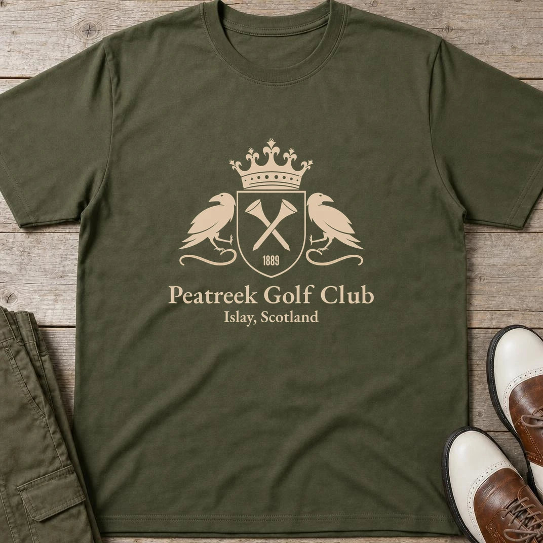Peatreek GC T-Shirt in Military Green lying on a plain floor. T-shirt is a unisex cut and 100 per cent cotton.