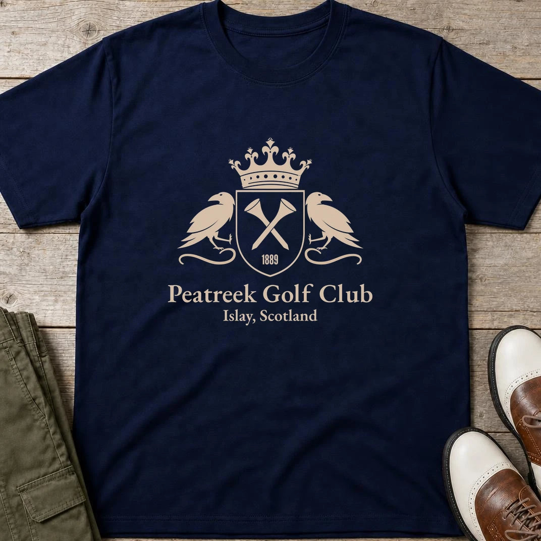 Peatreek GC T-Shirt in Navy lying on a plain floor. T-shirt is a unisex cut and 100 per cent cotton.