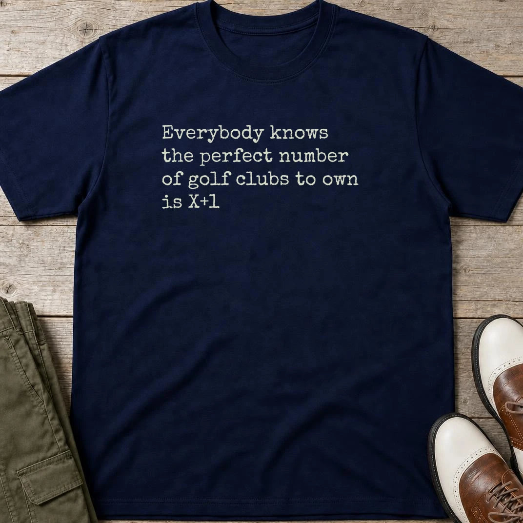 The Perfect Number T-Shirt in Navy lying on a plain floor. T-shirt is a unisex cut and 100 per cent cotton.