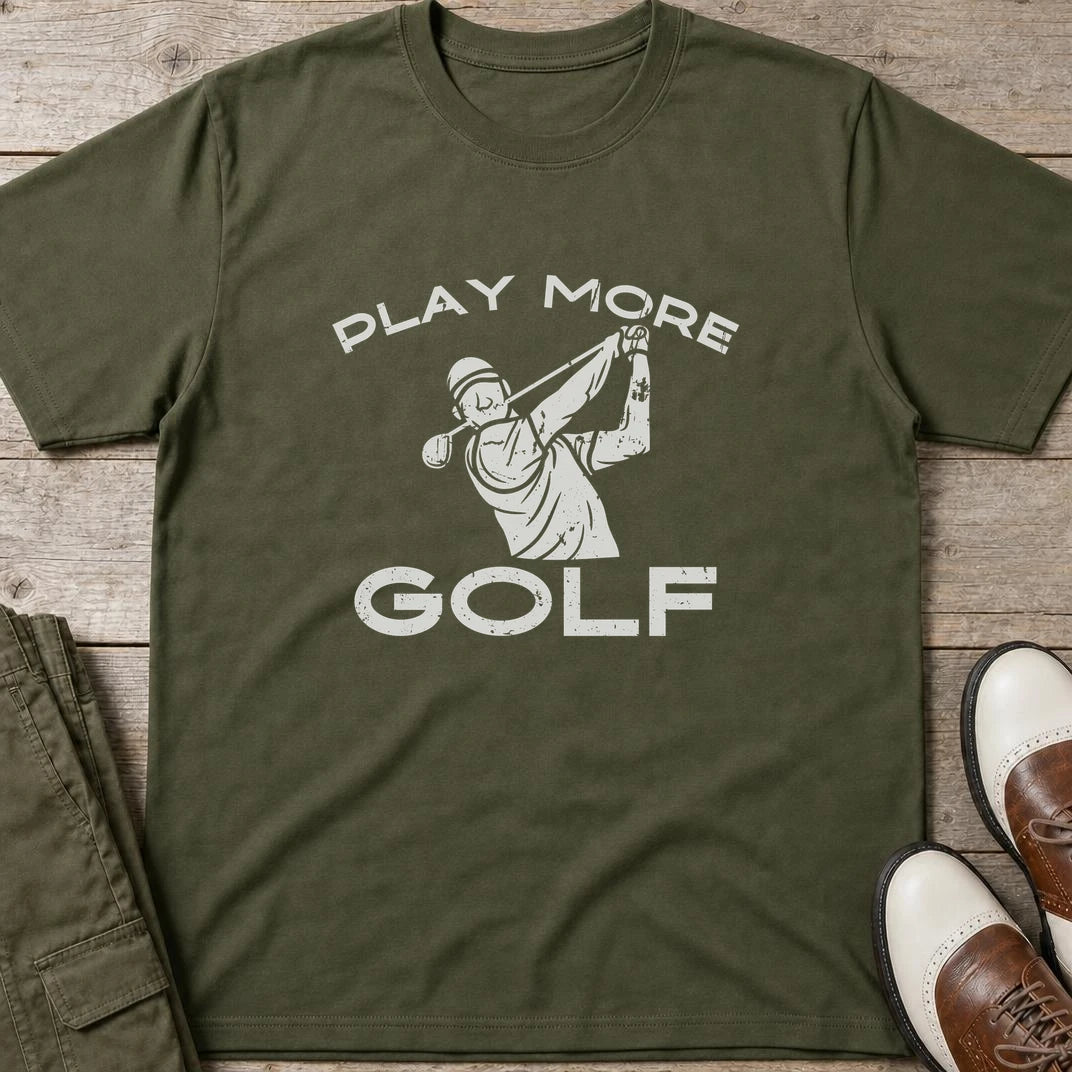 Play More Golf T-Shirt in Military Green lying on a plain floor. T-shirt is a unisex cut and 100 per cent cotton.
