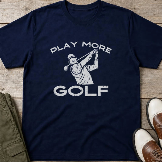 Play More Golf T-Shirt in Navy lying on a plain floor. T-shirt is a unisex cut and 100 per cent cotton.