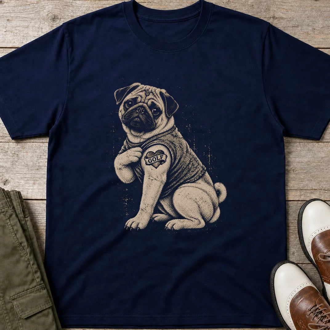 Pug Golfer T-Shirt in Navy lying on a plain floor. T-shirt is a unisex cut and 100 per cent cotton.