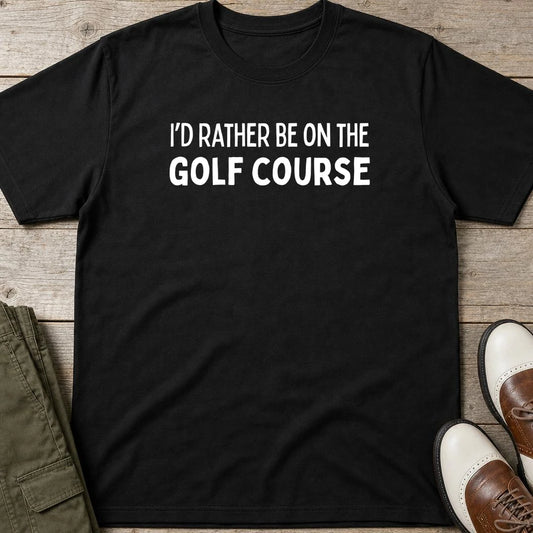 Rather Be T-Shirt in Black lying on a plain floor. T-shirt is a unisex cut and 100 per cent cotton.