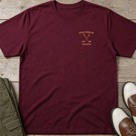 Rather Be Pocket T-Shirt in Maroon lying on a plain floor. T-shirt is a unisex cut and 100 per cent cotton.