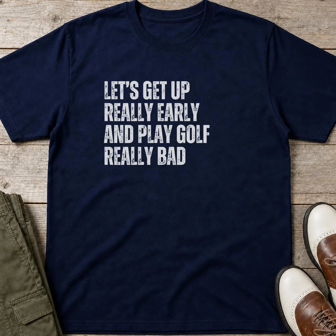Really Early T-Shirt in Navy lying on a plain floor. T-shirt is a unisex cut and 100 per cent cotton.
