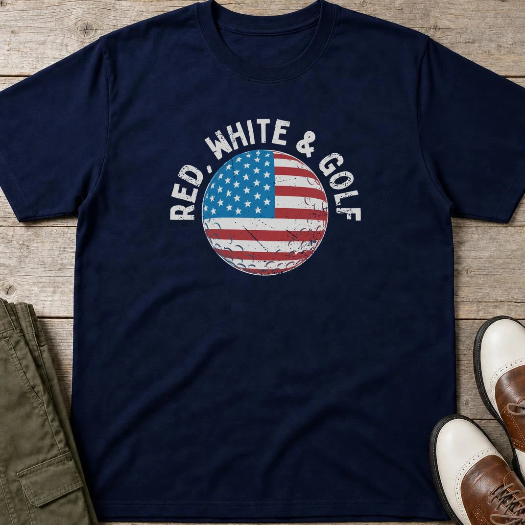 Red White & Golf T-Shirt in Navy lying on a plain floor. T-shirt is a unisex cut and 100 per cent cotton.