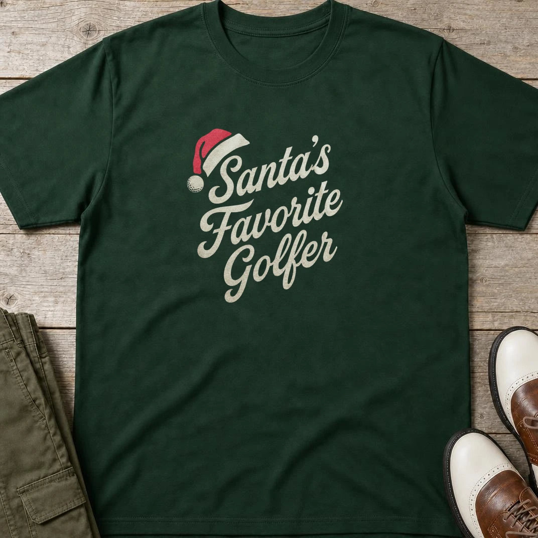 Santa's Favorite T-Shirt in Forest Green lying on a plain floor. T-shirt is a unisex cut and 100 per cent cotton.