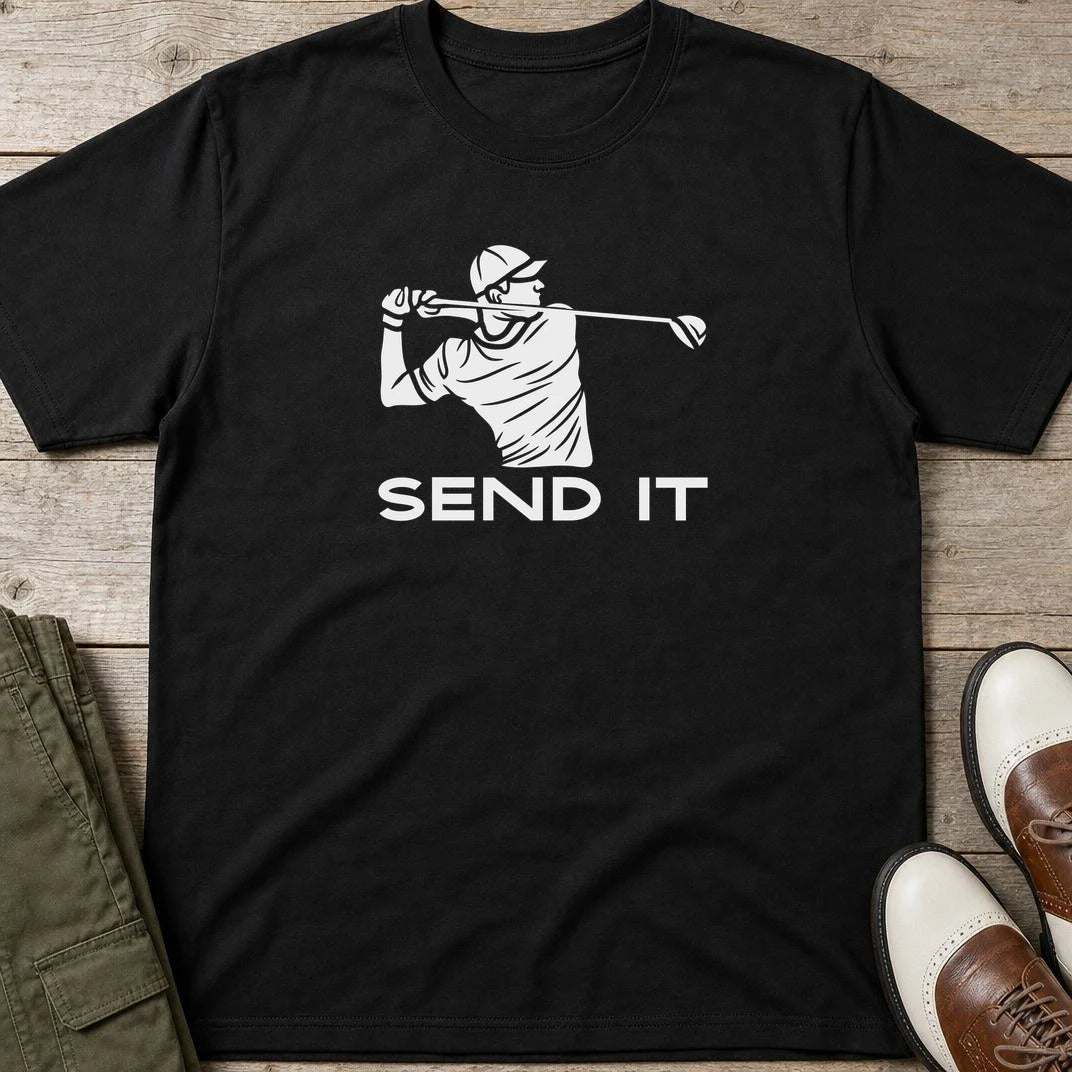 Send It T-Shirt in Black lying on a plain floor. T-shirt is a unisex cut and 100 per cent cotton.