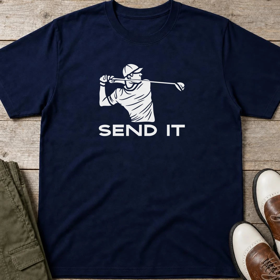Send It T-Shirt in Navy lying on a plain floor. T-shirt is a unisex cut and 100 per cent cotton.