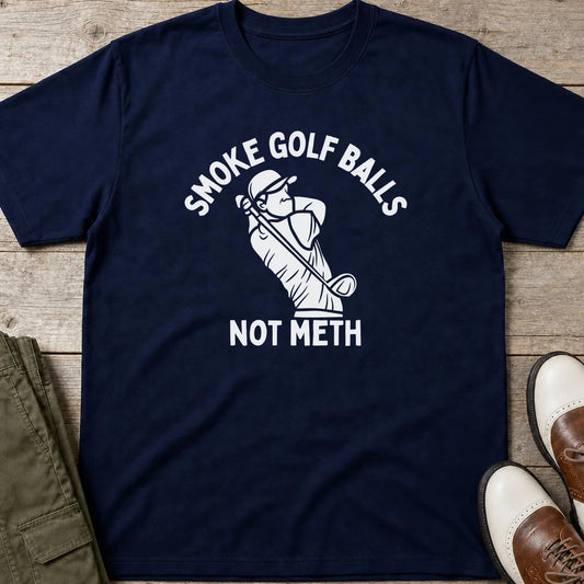 Smoke Golf Balls T-Shirt in Navy lying on a plain floor. T-shirt is a unisex cut and 100 per cent cotton.