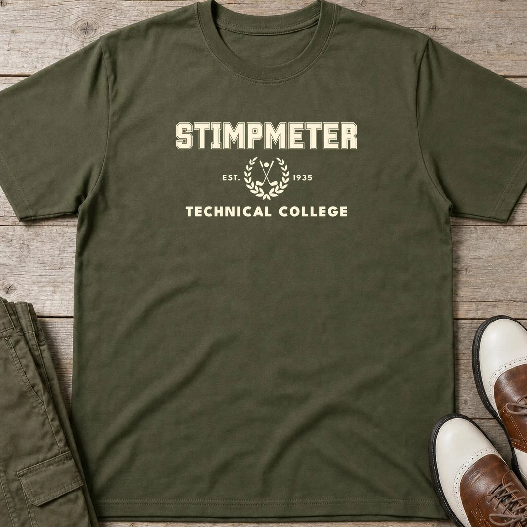 Stimpmeter T-Shirt in Military Green lying on a plain floor. T-shirt is a unisex cut and 100 per cent cotton.