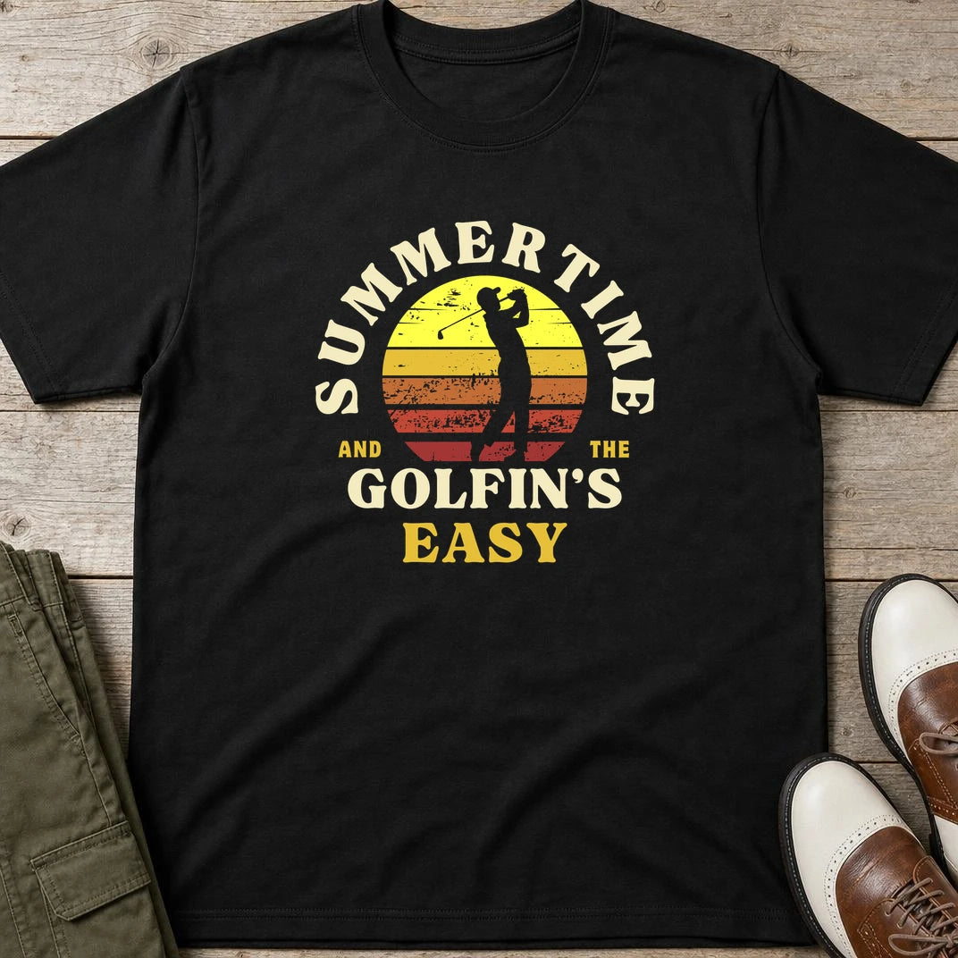 Summertime T-Shirt in Black lying on a plain floor. T-shirt is a unisex cut and 100 per cent cotton.