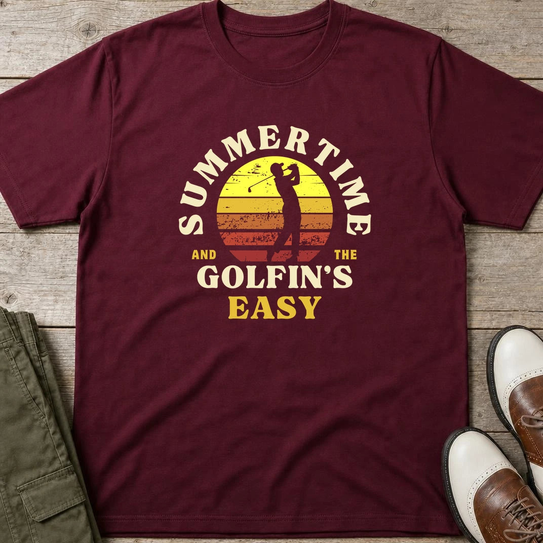 Summertime T-Shirt in Maroon lying on a plain floor. T-shirt is a unisex cut and 100 per cent cotton.