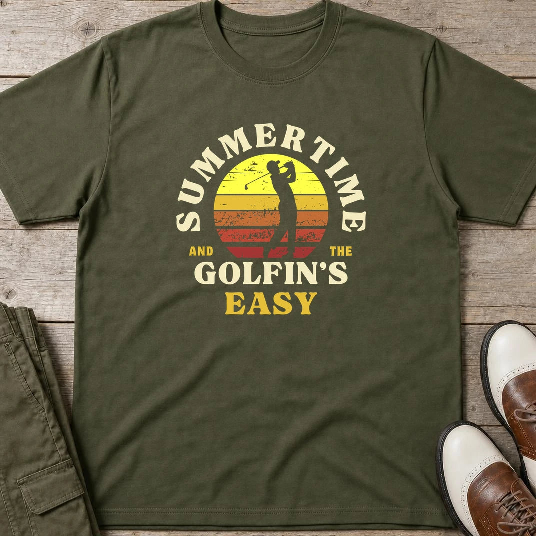 Summertime T-Shirt in Military Green lying on a plain floor. T-shirt is a unisex cut and 100 per cent cotton.