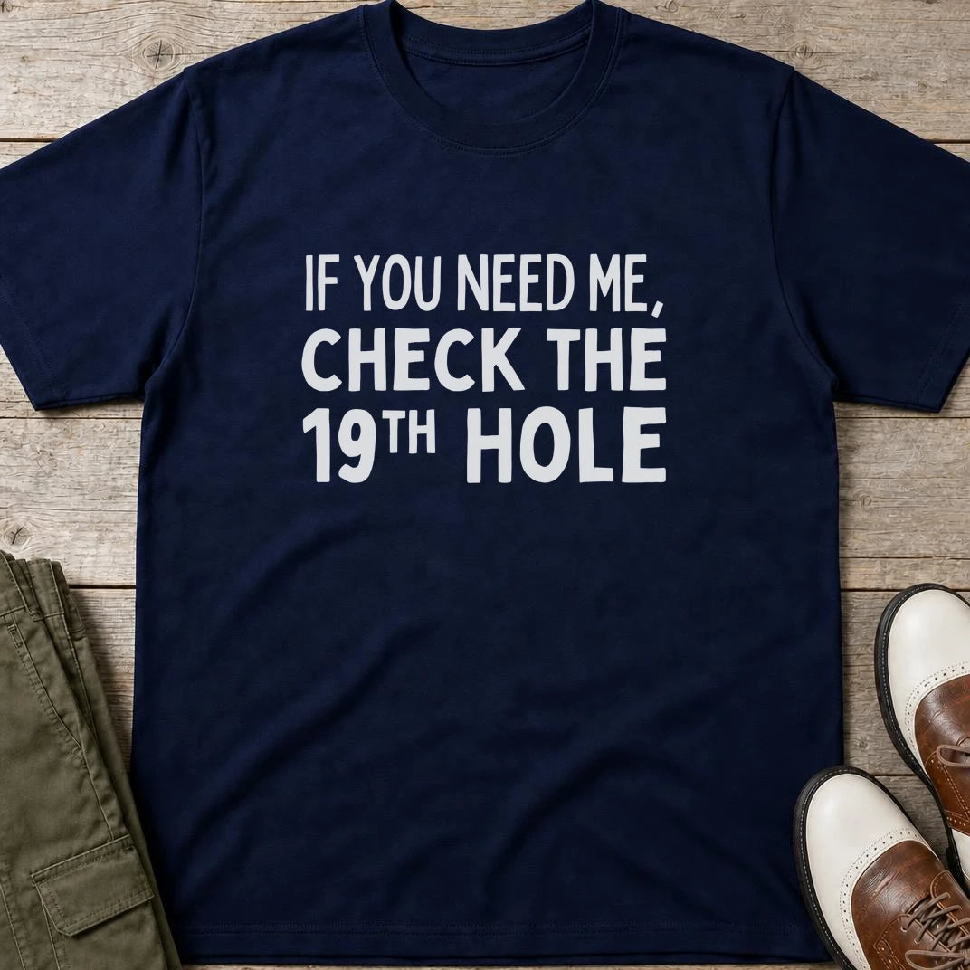 Check The 19th T-Shirt in Navy lying on a plain floor. T-shirt is a unisex cut and 100 per cent cotton.