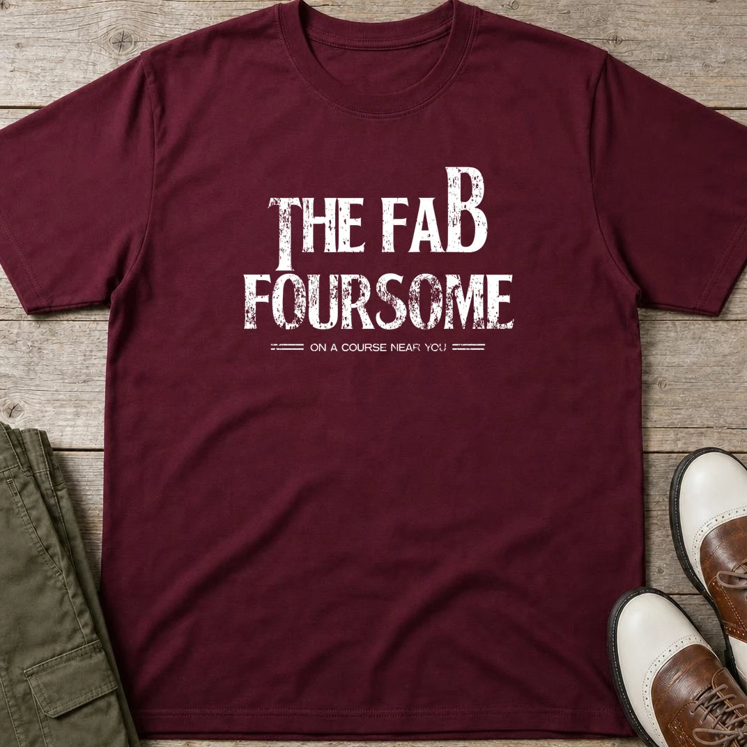 Fab Foursome T-Shirt in Maroon lying on a plain floor. T-shirt is a unisex cut and 100 per cent cotton.