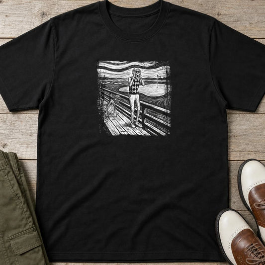 The Scream T-Shirt in lying on a plain floor. T-shirt is a unisex cut and 100 per cent cotton.