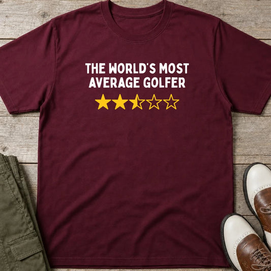 Most Average T-Shirt in Maroon lying on a plain floor. T-shirt is a unisex cut and 100 per cent cotton.