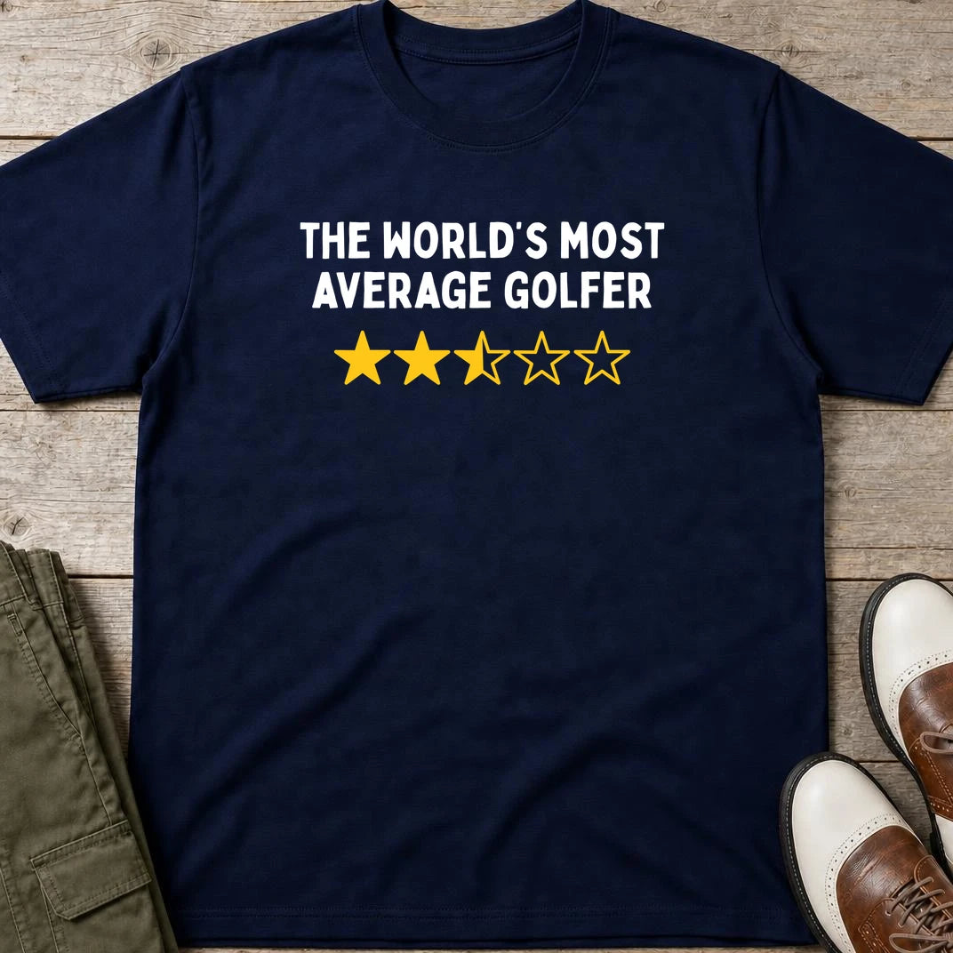 Most Average T-Shirt in Navy lying on a plain floor. T-shirt is a unisex cut and 100 per cent cotton.