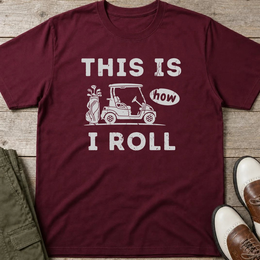 How I Roll T-Shirt in Maroon lying on a plain floor. T-shirt is a unisex cut and 100 per cent cotton.