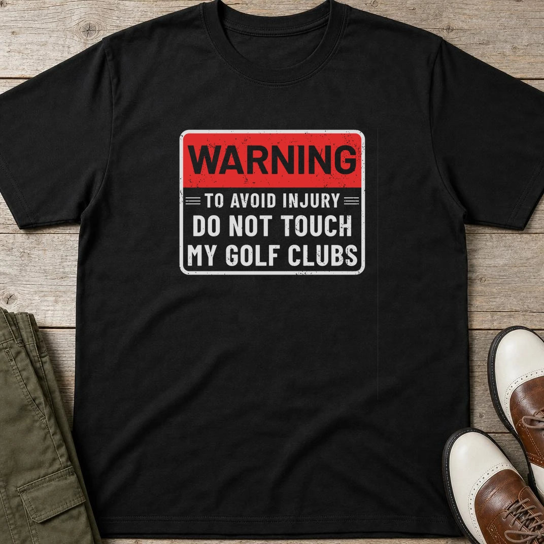 To Avoid Injury T-Shirt in Black lying on a plain floor. T-shirt is a unisex cut and 100 per cent cotton.