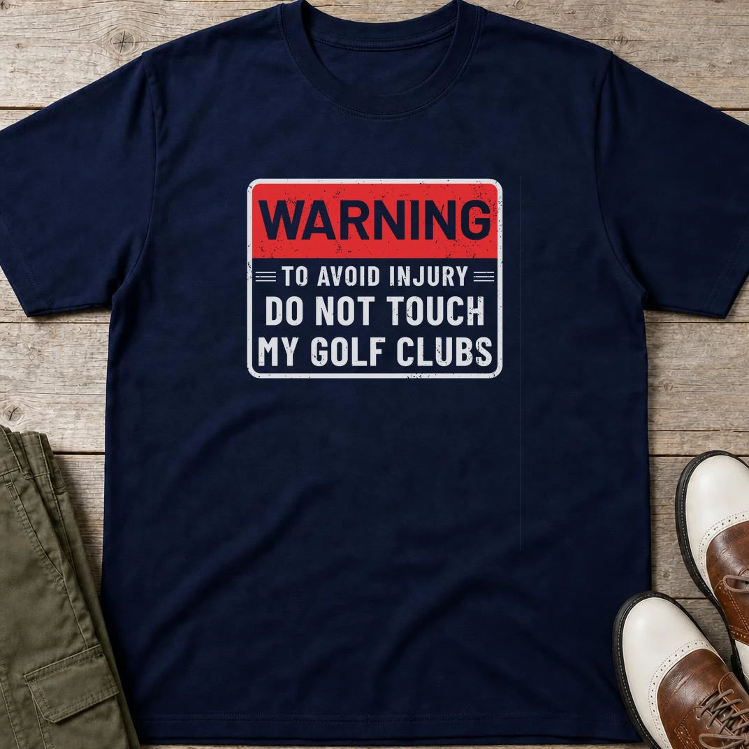 To Avoid Injury T-Shirt in Navy lying on a plain floor. T-shirt is a unisex cut and 100 per cent cotton.