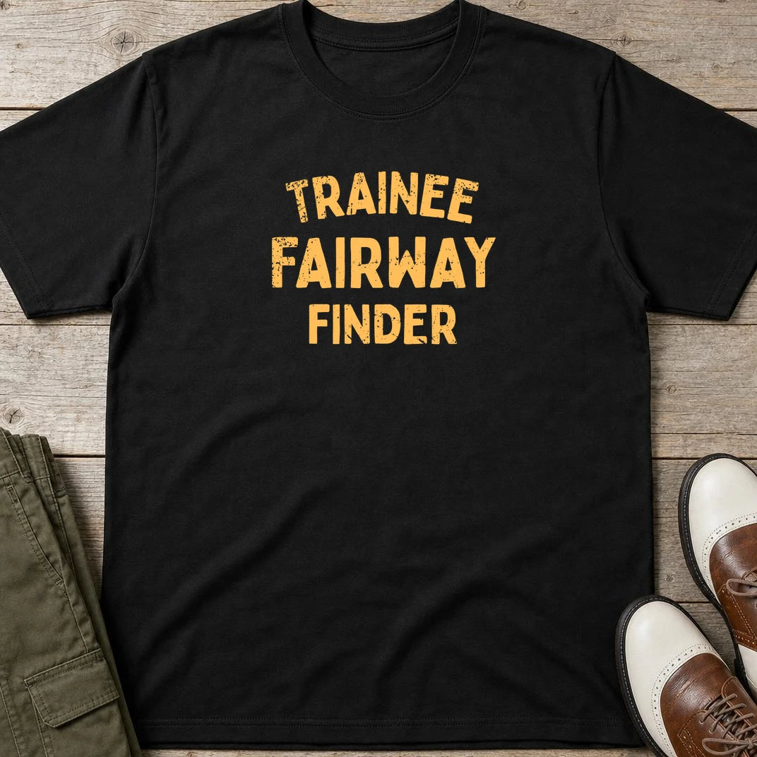 Fairway Finder T-Shirt in Black lying on a plain floor. T-shirt is a unisex cut and 100 per cent cotton.