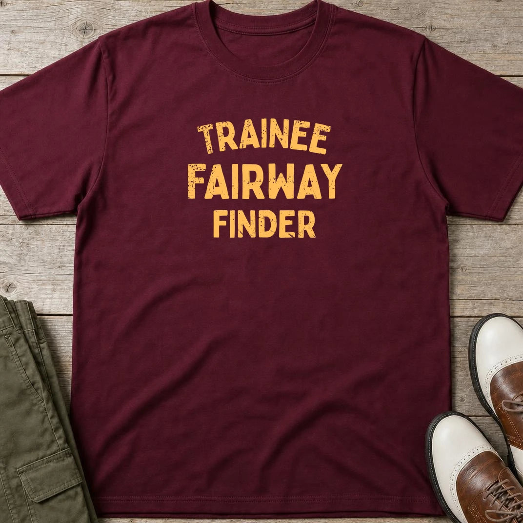 Fairway Finder T-Shirt in Maroon lying on a plain floor. T-shirt is a unisex cut and 100 per cent cotton.