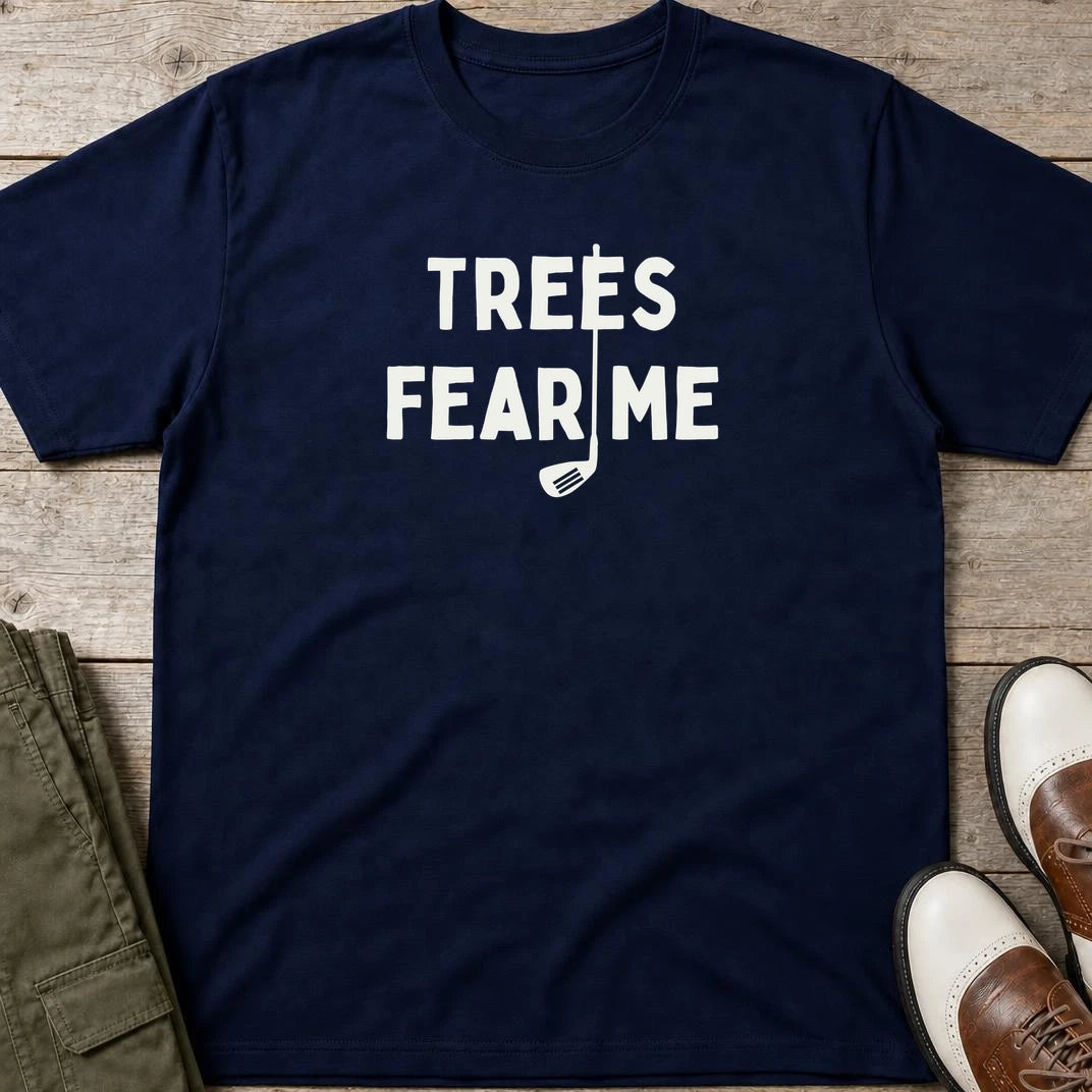 Trees Fear Me T-Shirt in Navy lying on a plain floor. T-shirt is a unisex cut and 100 per cent cotton.