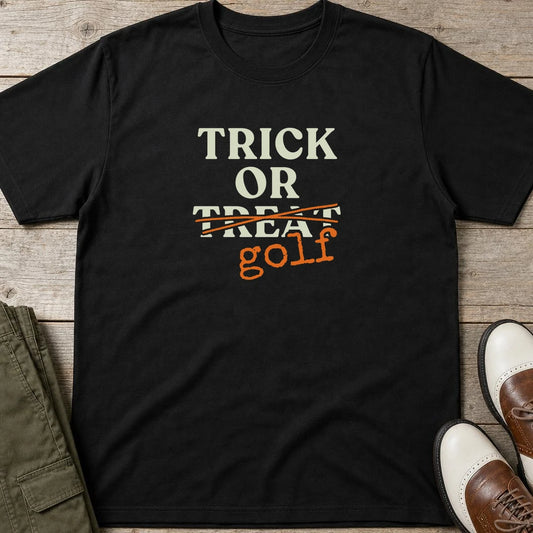 Trick Or T-Shirt in Black lying on a plain floor. T-shirt is a unisex cut and 100 per cent cotton.