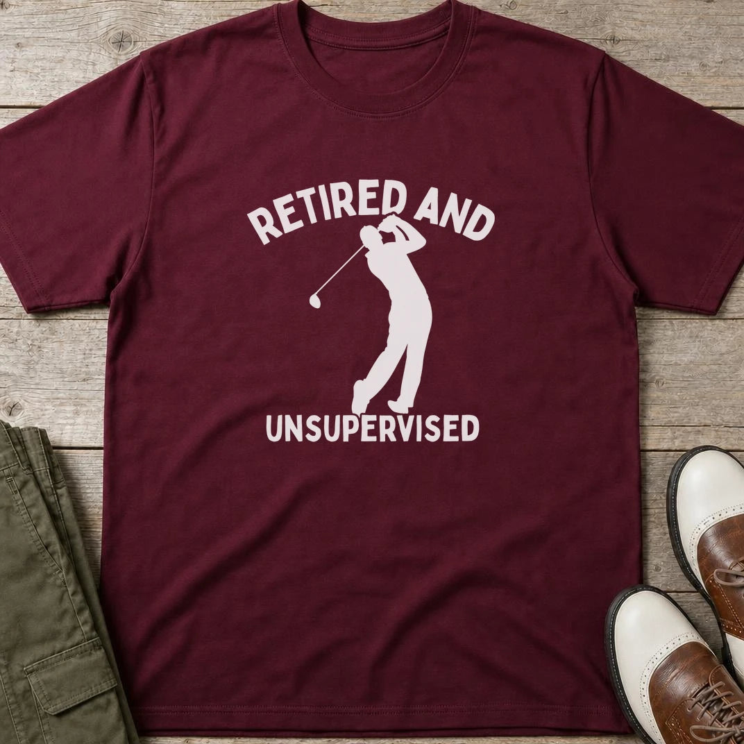Unsupervised T-Shirt in Maroon lying on a plain floor. T-shirt is a unisex cut and 100 per cent cotton.