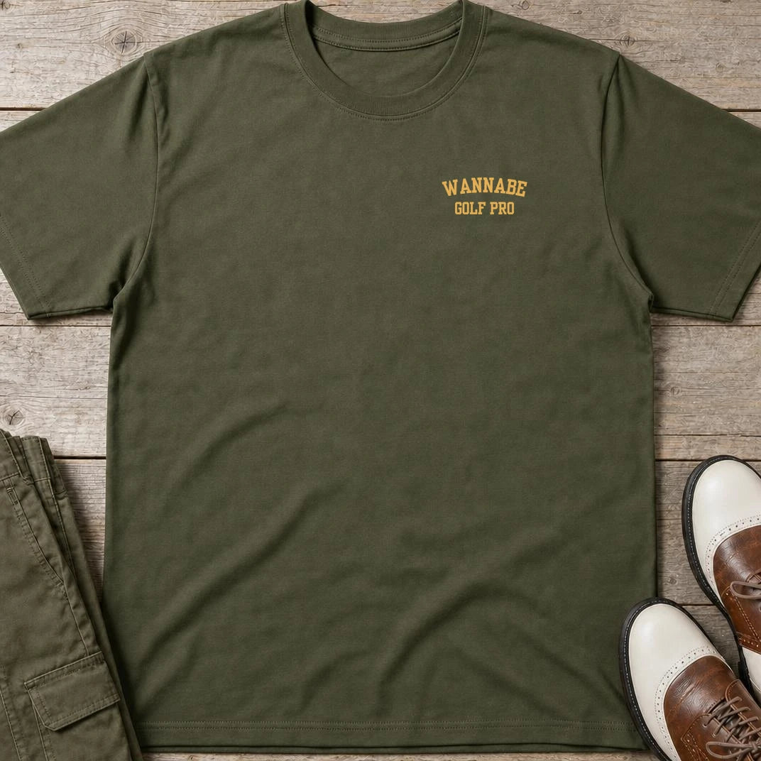 Wannabe Pocket T-Shirt in Military Green lying on a plain floor. T-shirt is a unisex cut and 100 per cent cotton.