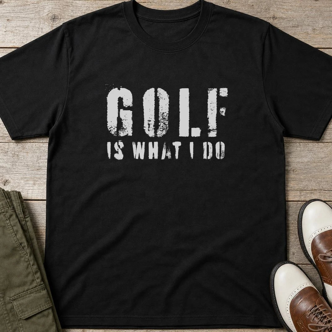 What I Do T-Shirt in Black lying on a plain floor. T-shirt is a unisex cut and 100 per cent cotton.