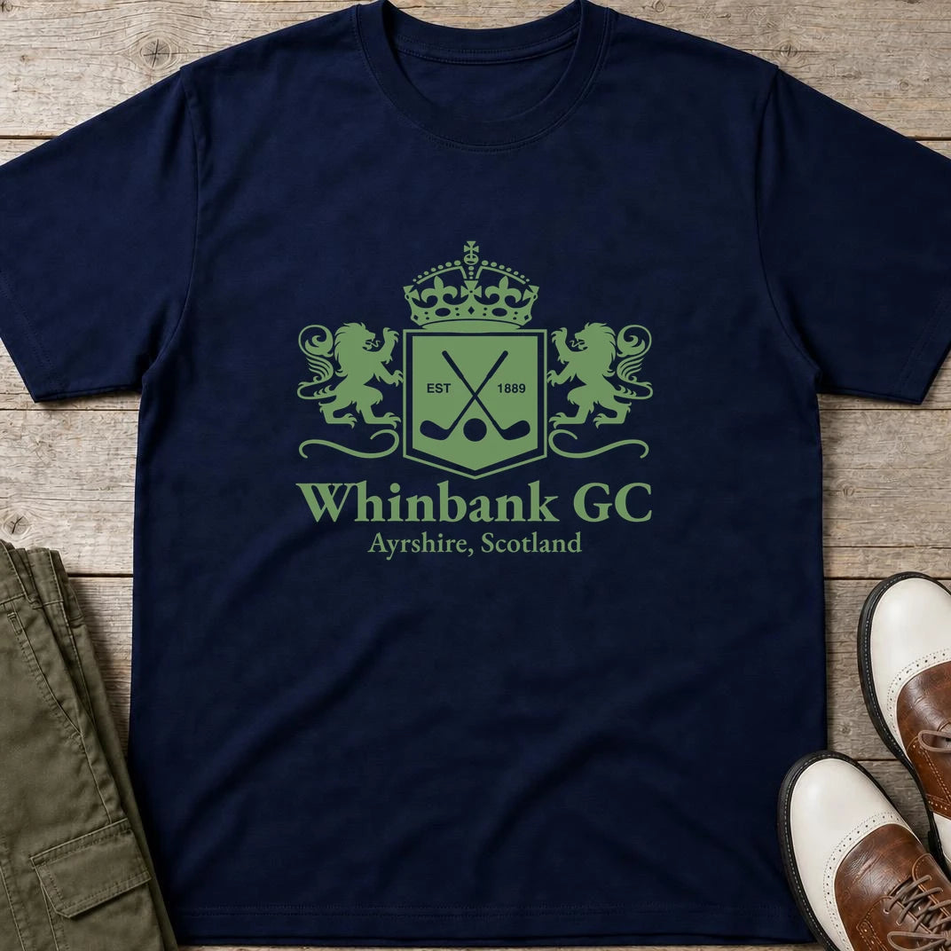 Whinbank GC T-Shirt in Navy lying on a plain floor. T-shirt is a unisex cut and 100 per cent cotton.