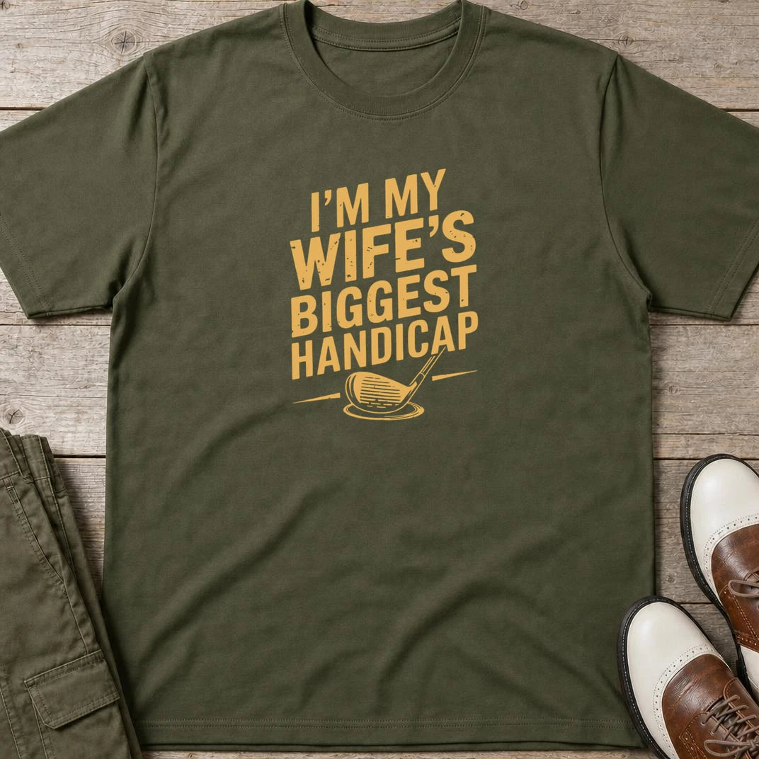 Biggest Handicap T-Shirt in Military Green lying on a plain floor. T-shirt is a unisex cut and 100 per cent cotton.