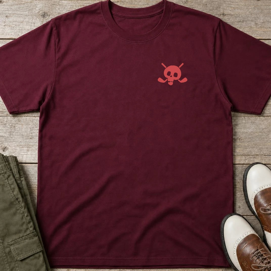 X-Bones Golf Pocket T-Shirt in Maroon lying on a plain floor. T-shirt is a unisex cut and 100 per cent cotton.