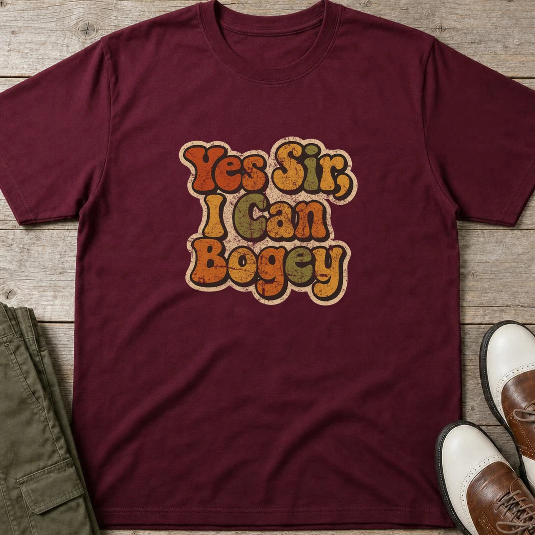 I Can Bogey T-Shirt in Maroon lying on a plain floor. T-shirt is a unisex cut and 100 per cent cotton.