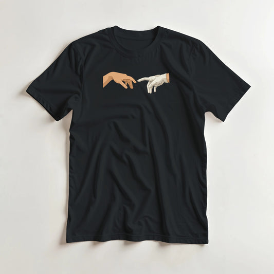 The Glove of God T-Shirt in Black lying on a plain floor. T-shirt is a unisex cut and 100 per cent cotton.