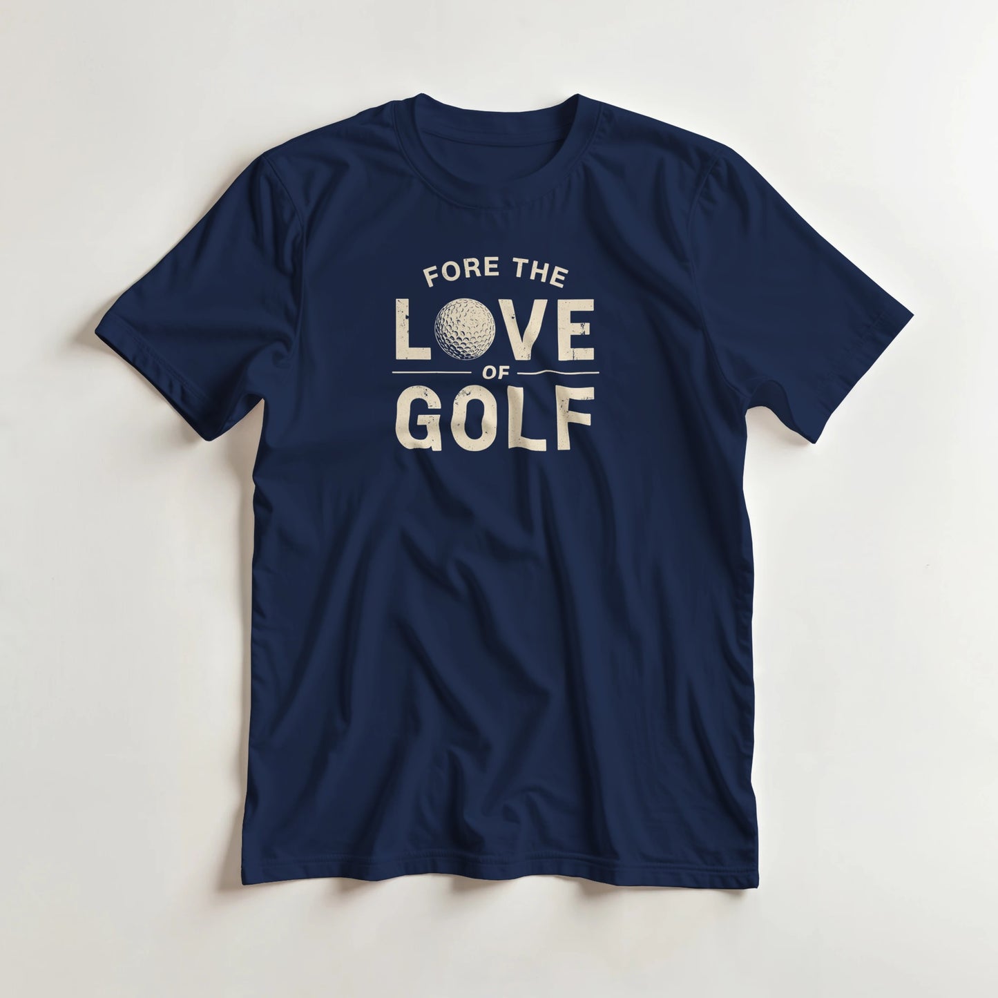 Love Of Golf T-Shirt in Navy lying on a plain floor. T-shirt is a unisex cut and 100 per cent cotton.