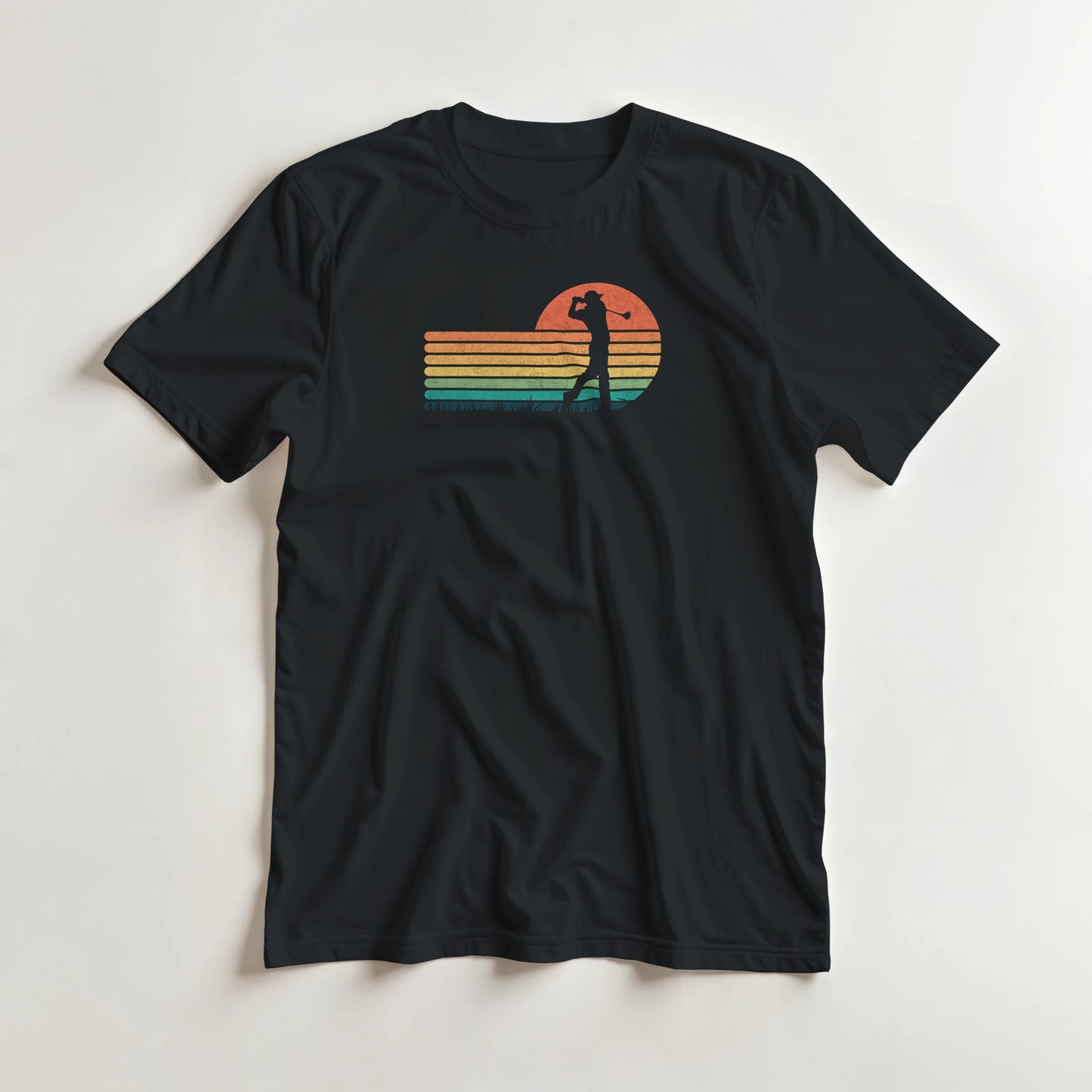 Vintage Golfer T-Shirt in Black M lying on a plain floor. T-shirt is a unisex cut and 100 per cent cotton.