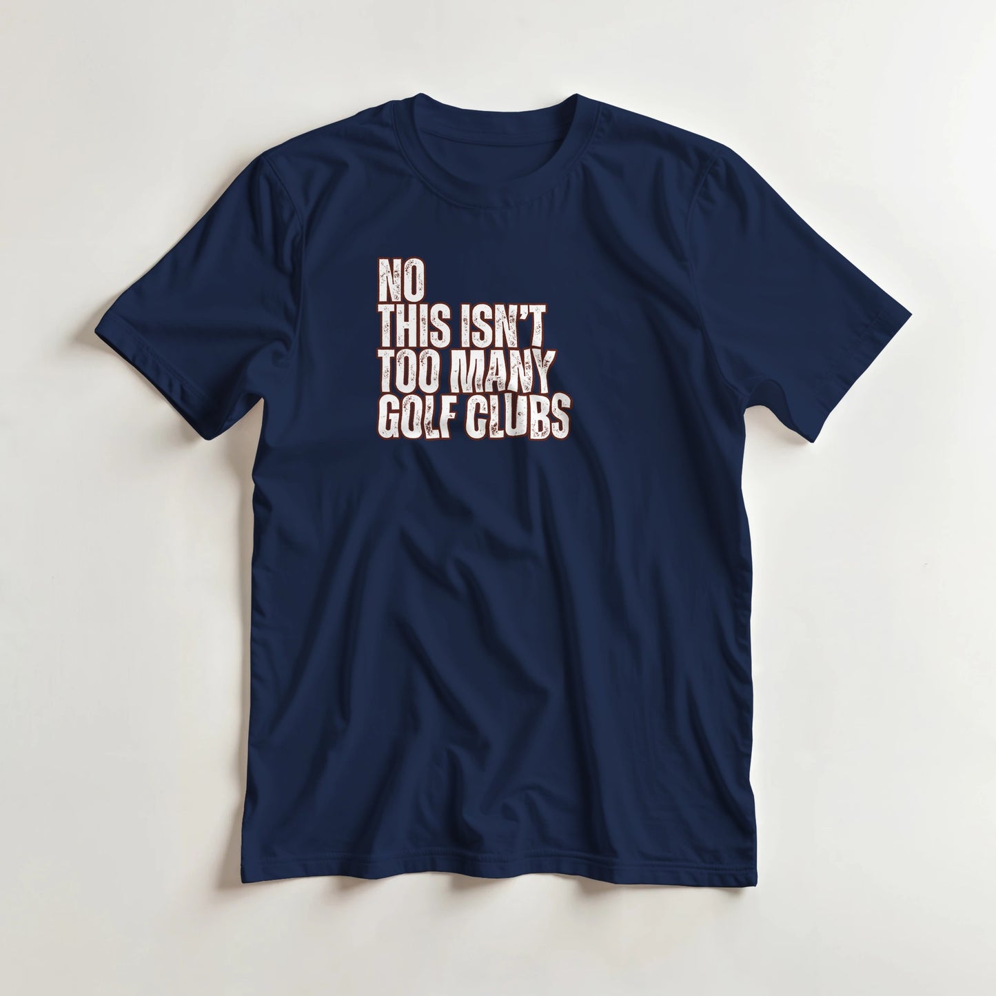 Too Many T-Shirt in Navy S lying on a plain floor. T-shirt is a unisex cut and 100 per cent cotton.