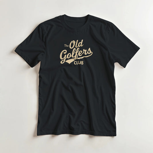 Old Golfers Club T-Shirt in S lying on a plain floor. T-shirt is a unisex cut and 100 per cent cotton.