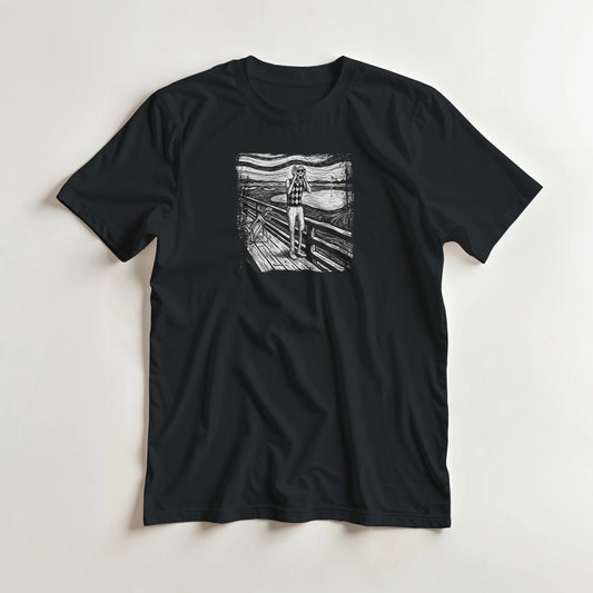 The Scream T-Shirt in lying on a plain floor. T-shirt is a unisex cut and 100 per cent cotton.
