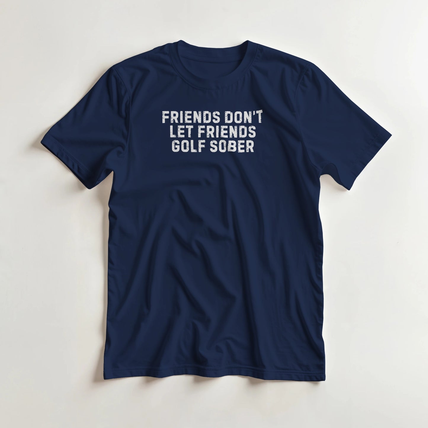 Friends T-Shirt in Navy lying on a plain floor. T-shirt is a unisex cut and 100 per cent cotton.