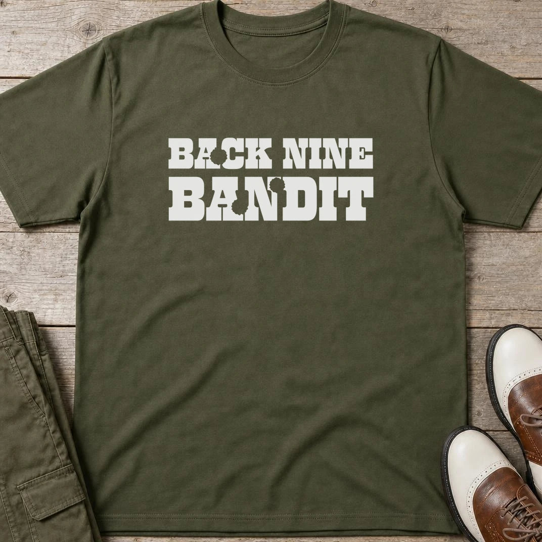Bandit T-Shirt in Military Green lying on a plain floor. T-shirt is a unisex cut and 100 per cent cotton.