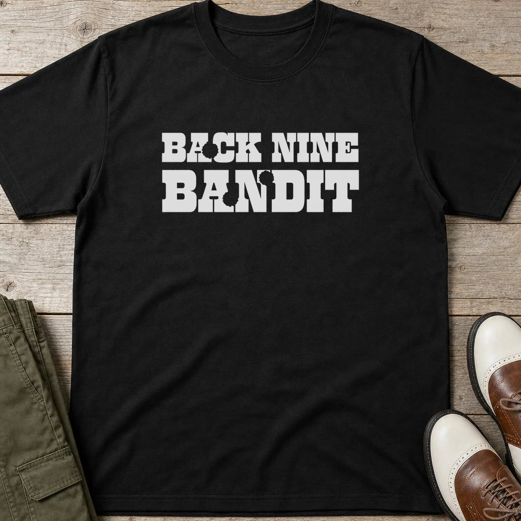 Bandit T-Shirt in Black lying on a plain floor. T-shirt is a unisex cut and 100 per cent cotton.