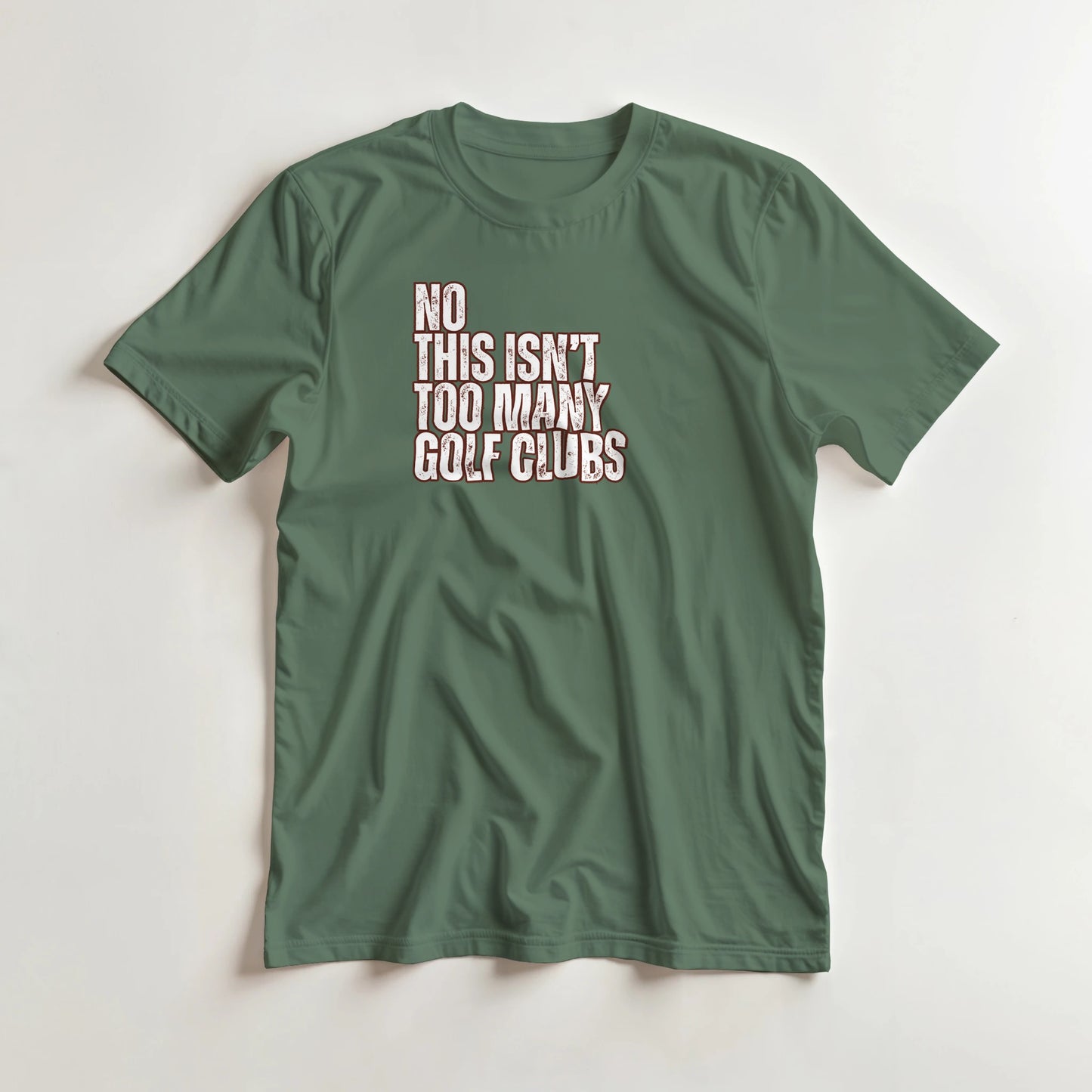 Too Many T-Shirt in Military Green 2XL lying on a plain floor. T-shirt is a unisex cut and 100 per cent cotton.