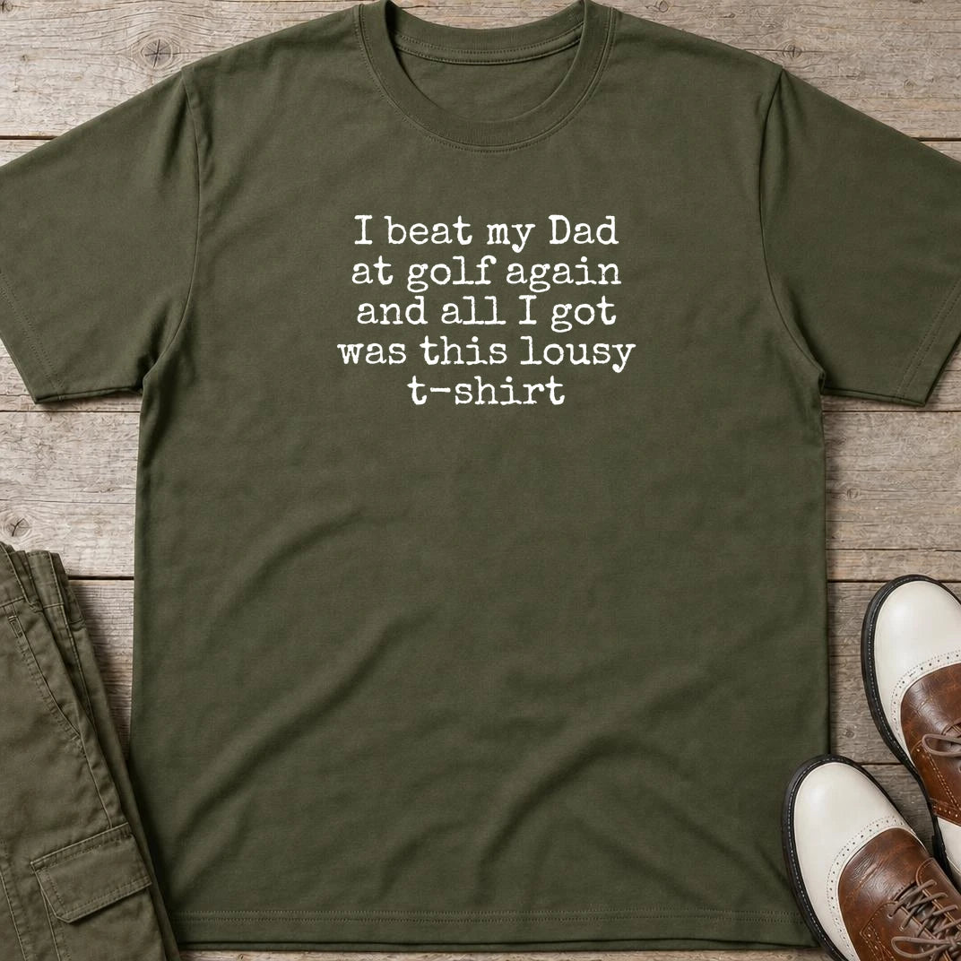 Beat My Dad T-Shirt in Military Green lying on a plain floor. T-shirt is a unisex cut and 100 per cent cotton.