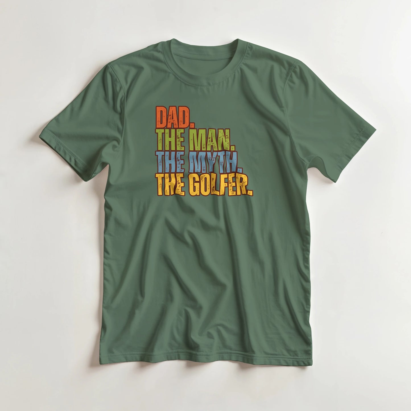Dad The Legend Golfer T-Shirt in Military Green L lying on a plain floor. T-shirt is a unisex cut and 100 per cent cotton.